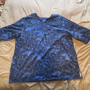 Catherine’s Blouse with filagree black print on blue.